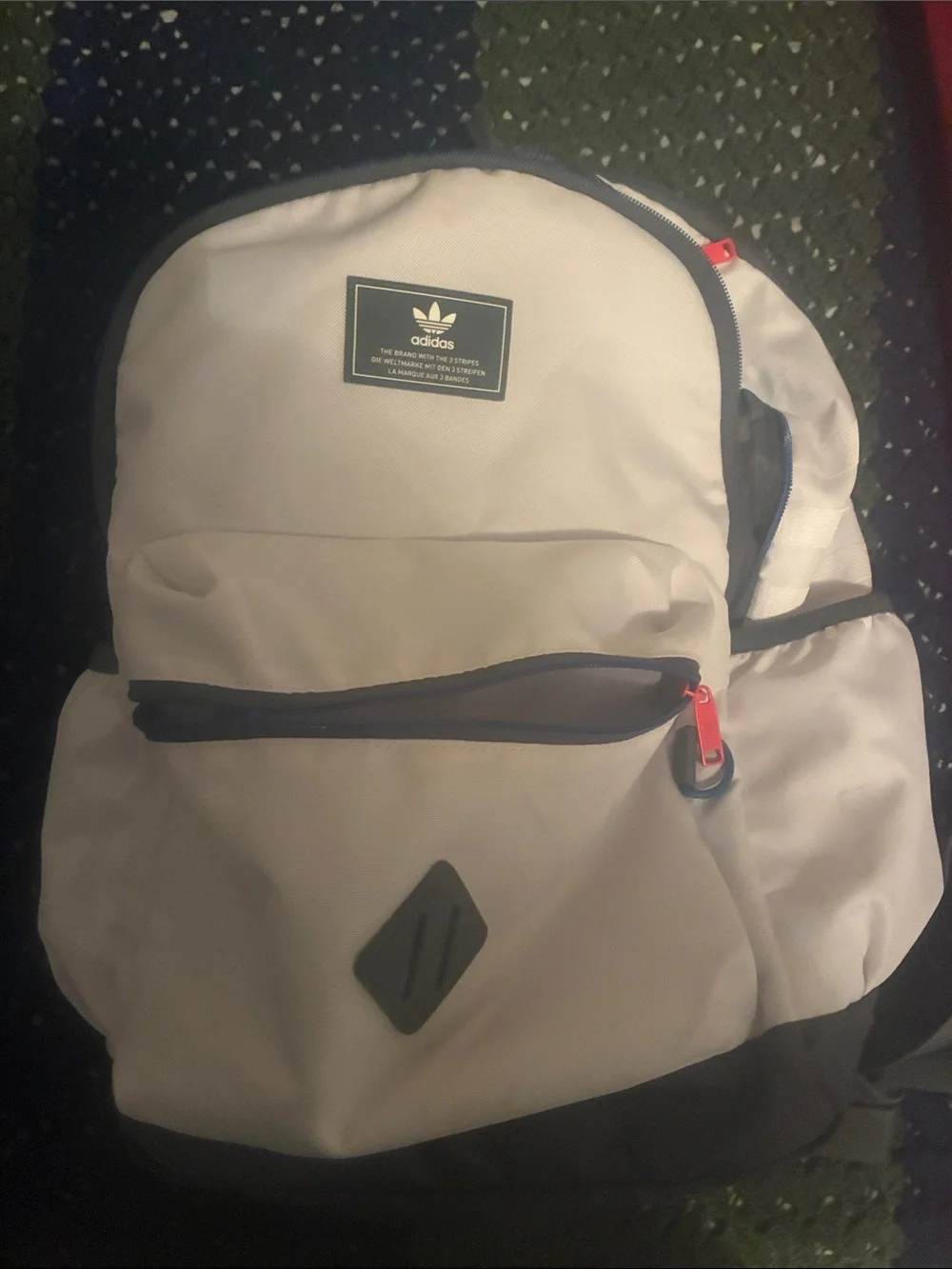 adidas White Backpack with Black Trim and Red Zipper Pulls